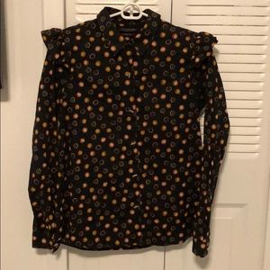 Ruffle sleeve all over printed blouse.